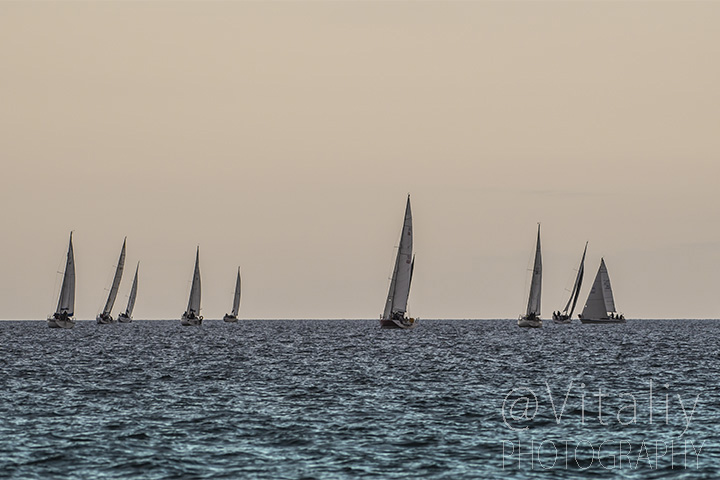 Sails over horizon.