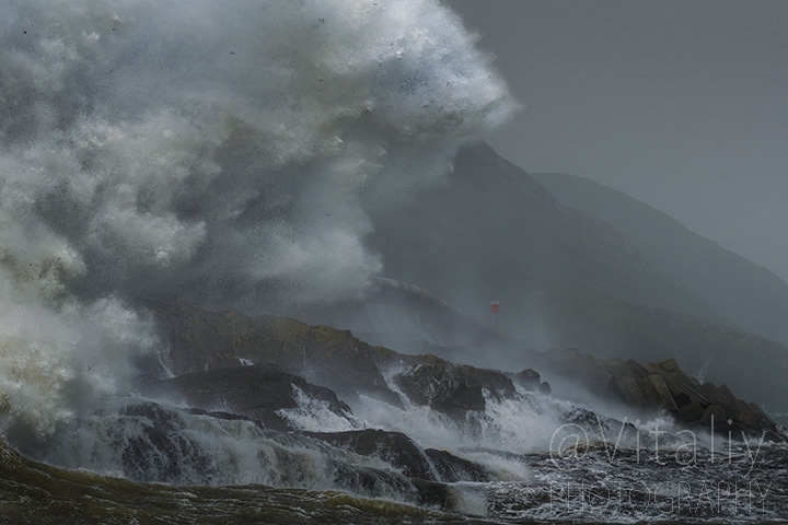 Huge wave breaks over rocks of Greystones Cove.